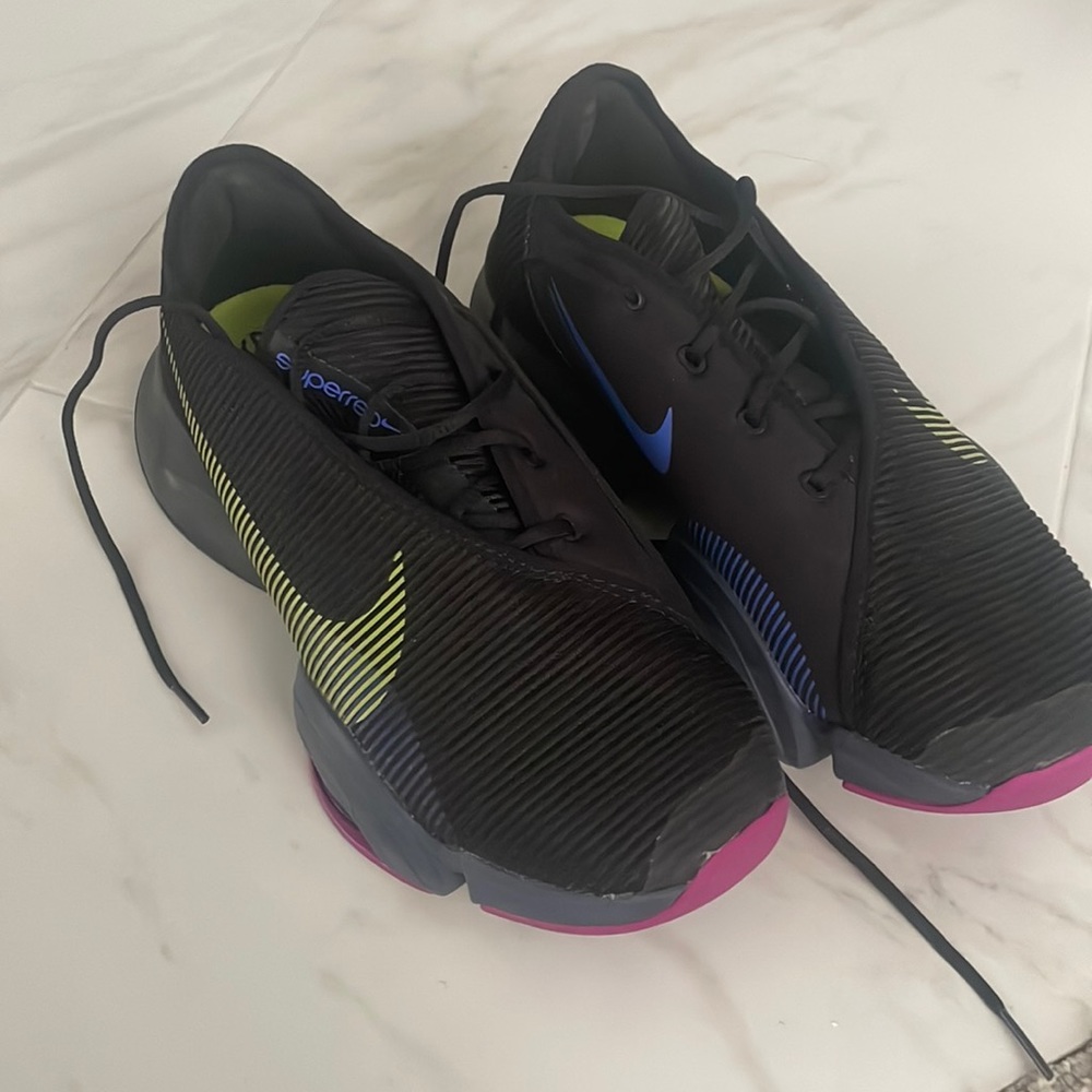 Nike Black Athletic Shoes with Lime Green & Blue Accents and Pink Soles